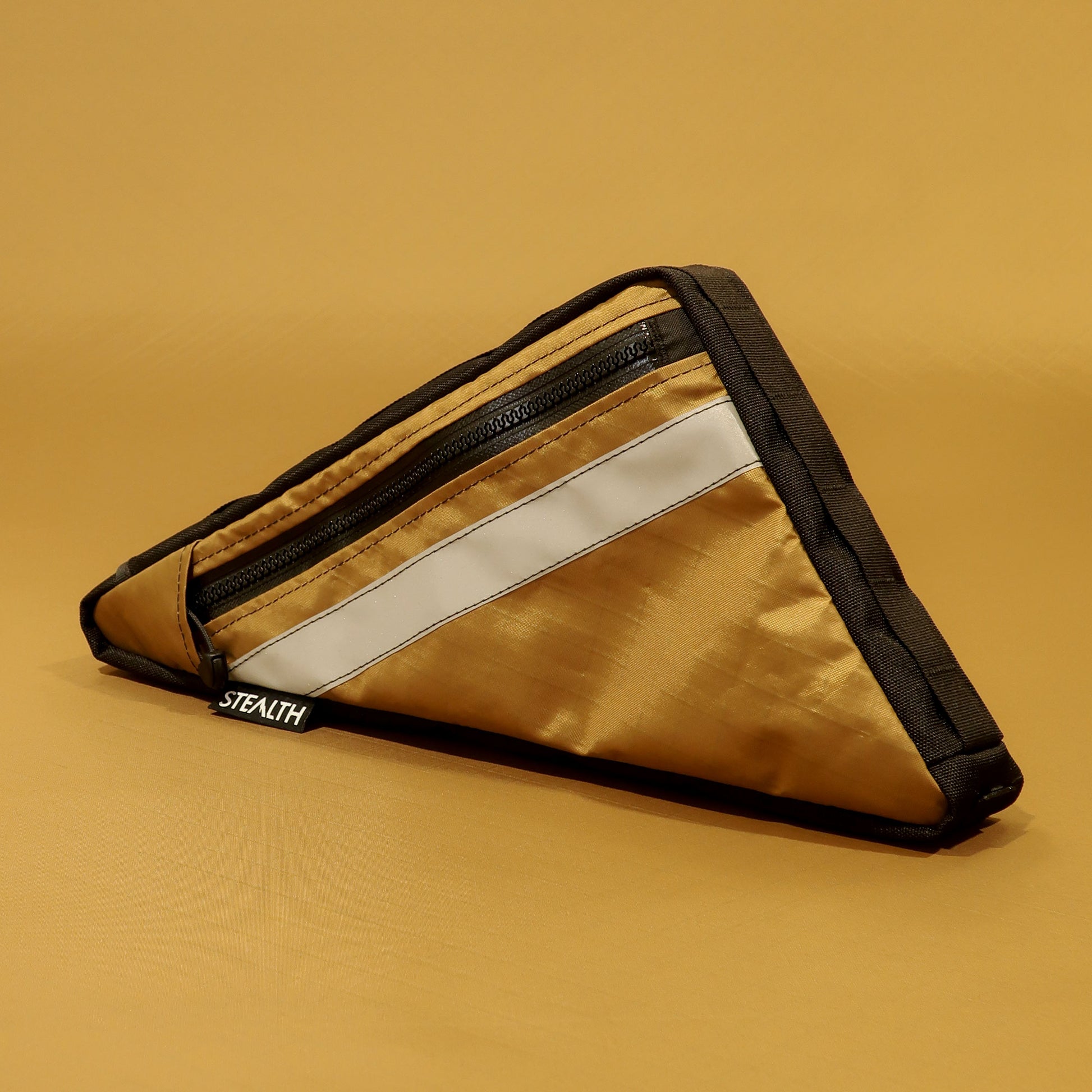 Custom single zip full frame bag in coyote EPX200 fabric with reflective trim and map pocket made by Stealth Wellington NZ