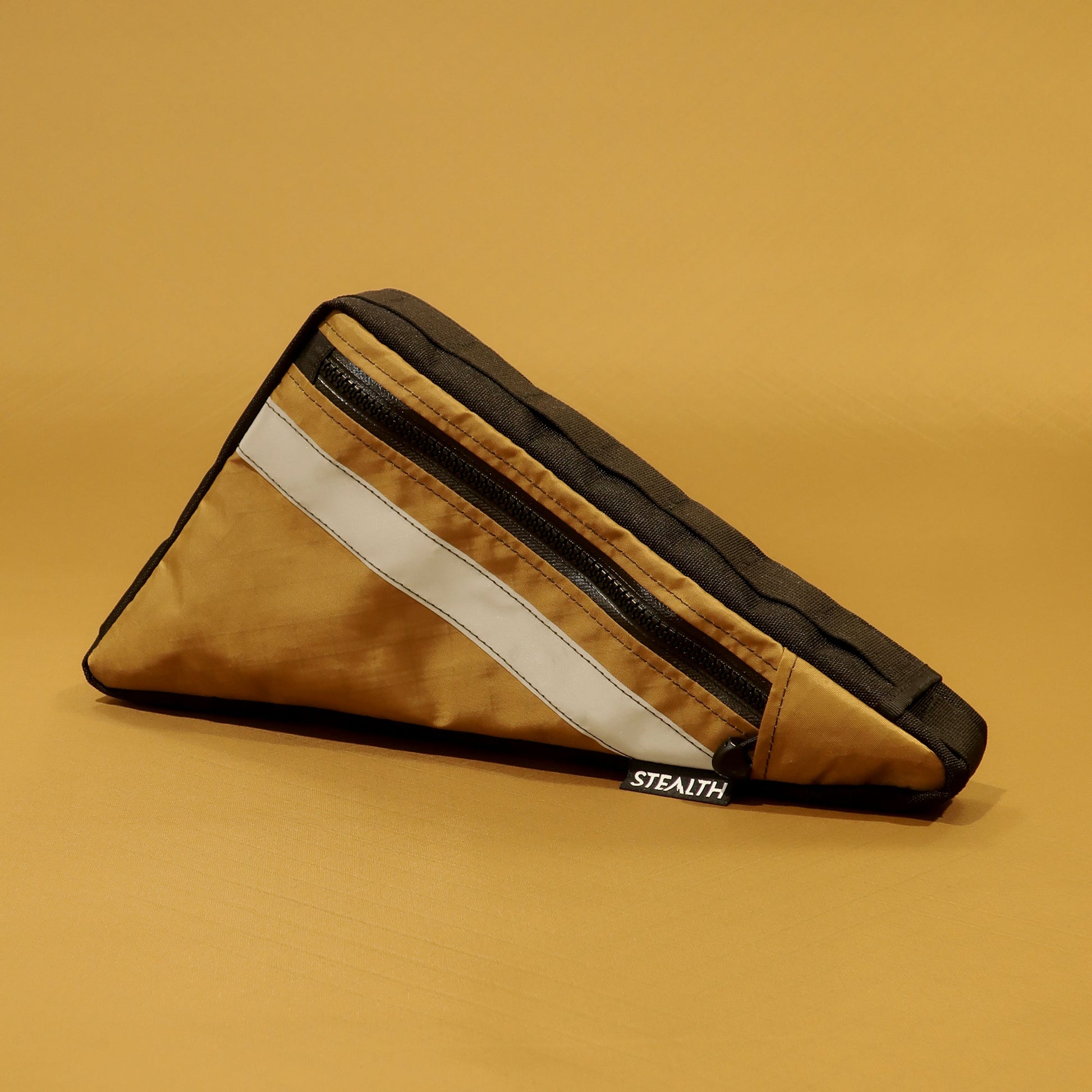 Custom single zip full frame bag in coyote EPX200 fabric with reflective trim made by Stealth Wellington NZ