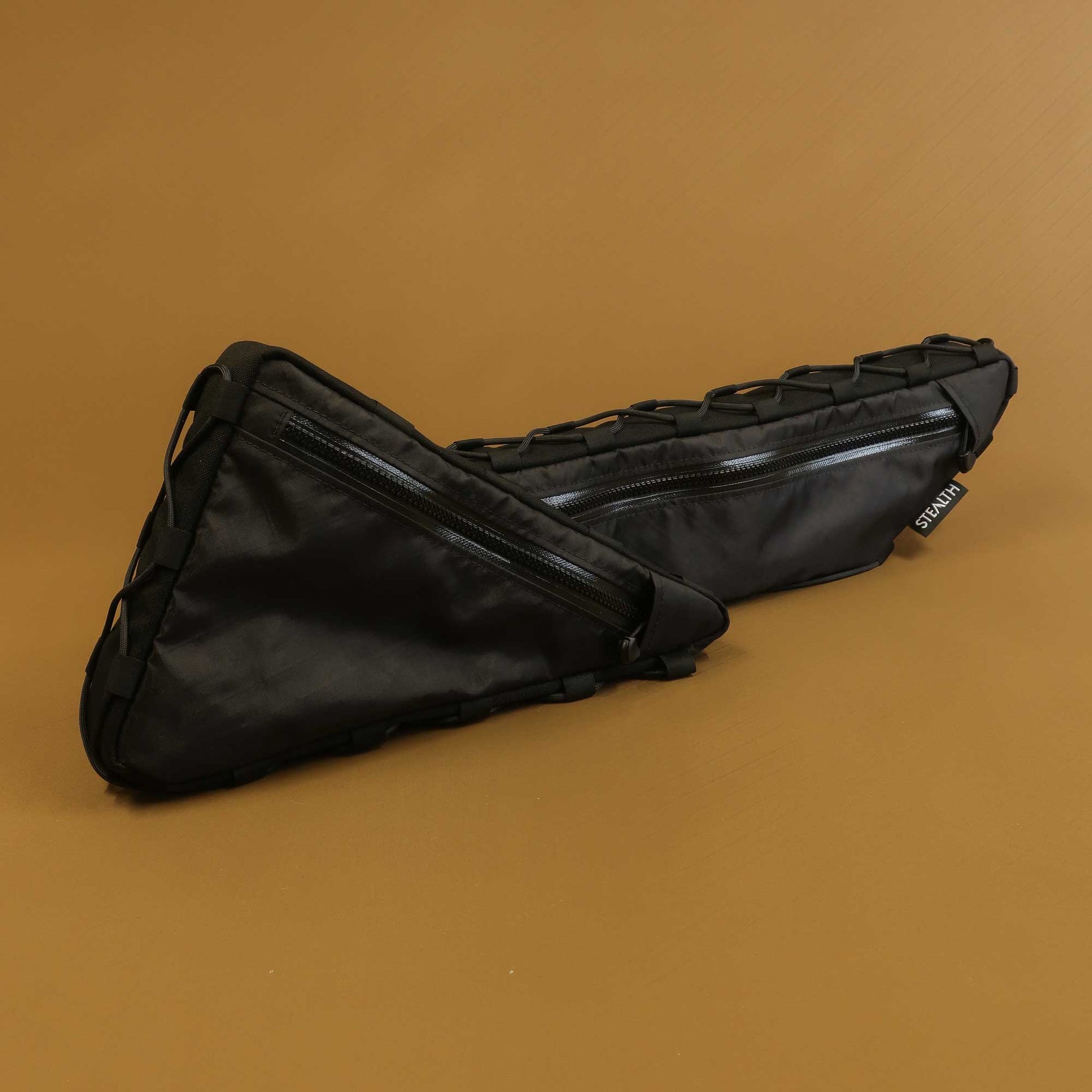 Split full frame bag in black Ecopak shown separated into two sections made by Stealth Wellington NZ