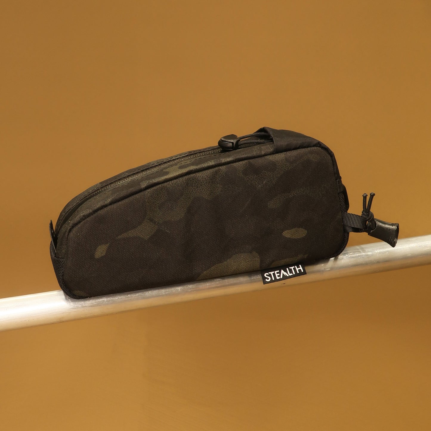 Top Loader bolt on top tube bag in EPLX600 Multicam Black with cable port and bungee front made by Stealth Wellington NZ