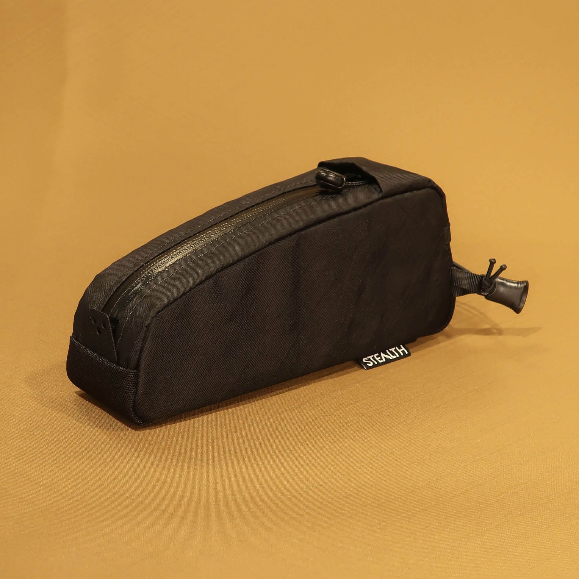 Bolt-on top loader top tube bag in black Ecopak recycled fabric made by Stealth Wellington NZ