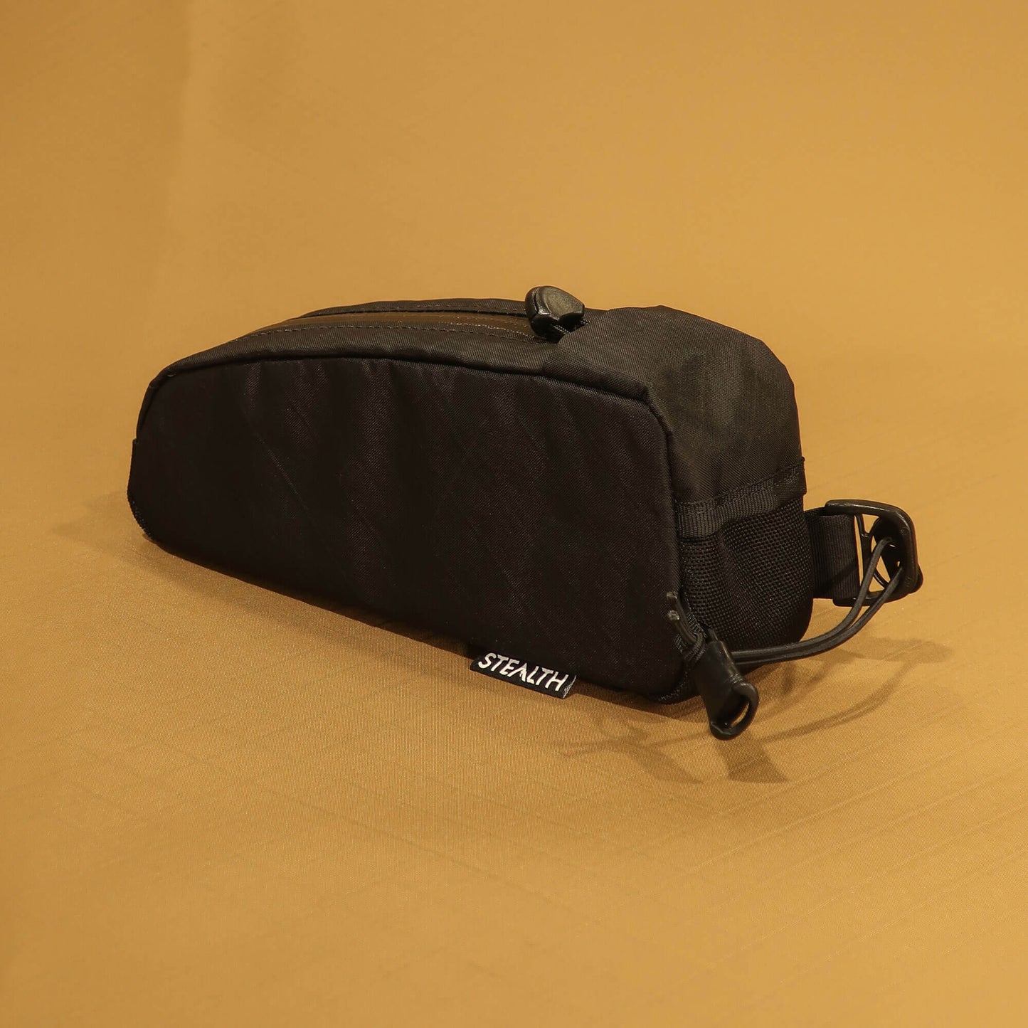 Bolt-on top loader top tube bag showing strap attachment system made by Stealth Wellington NZ