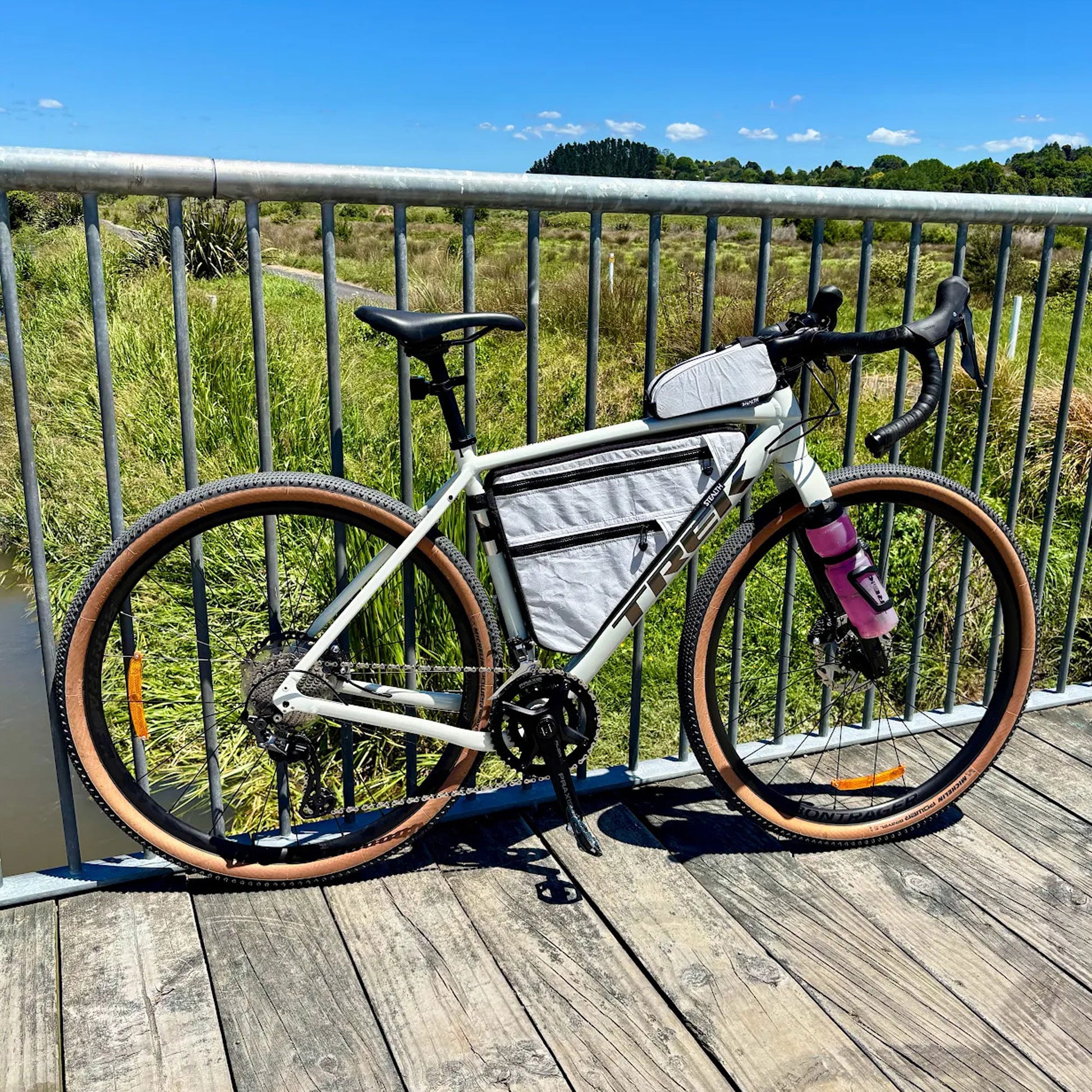 Trek checkpoint with bolt on top loader in Ultra200 white and custom frame bag Stealth NZ