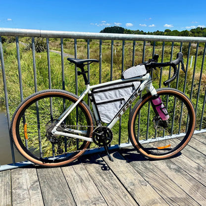 Trek checkpoint with bolt on top loader in Ultra200 white and custom frame bag Stealth NZ