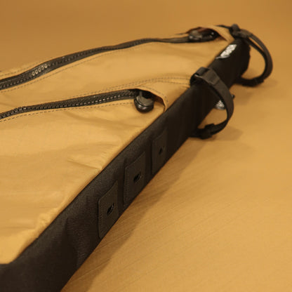 Tan and black custom full frame bag with double zippers and bolt-on attachment, designed for the Tumbleweed Prospector bike.
