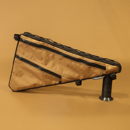Coyote custom full frame bag with double zips and multiple attachment points, designed for Tumbleweed Prospector adventure bike, handmade in New Zealand.
