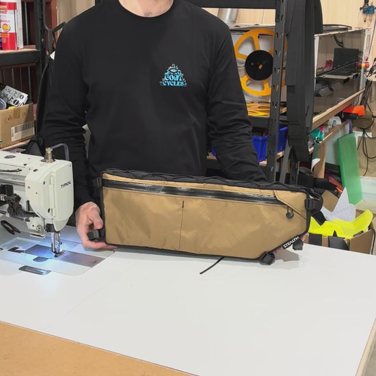 An overview of a custom half frame bag for a Kona Rove gravel bike