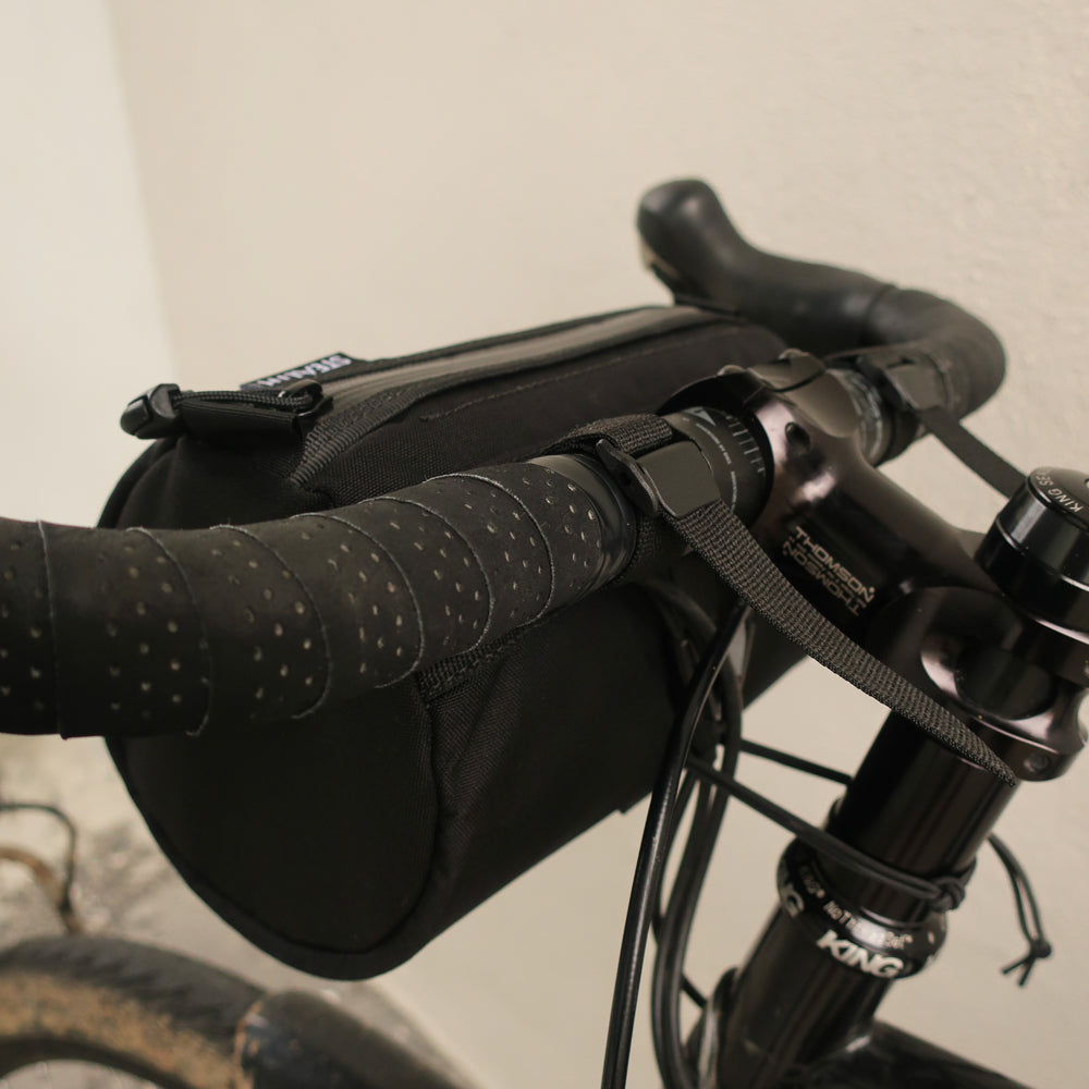 Handlebar bag attachments